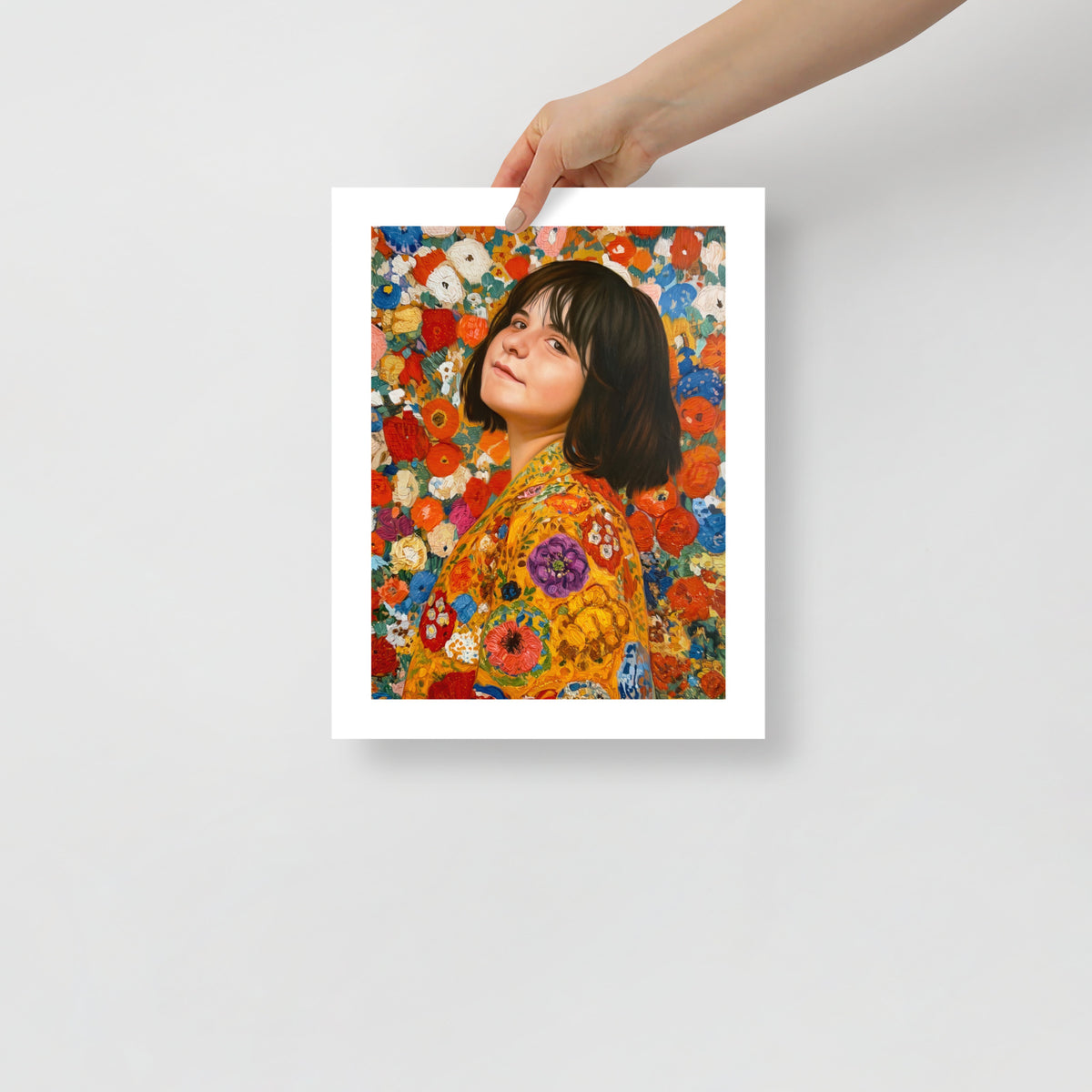 MEFREEK Seth Jennemann Open Edition Art Prints A Fire Escape Made Of Punchlines AKA A Life Jacket Full Of Laughter – Unframed fine art print held by hand against a light gray background, depicting a woman with a dark bob haircut wearing a richly patterned golden yellow floral jacket, surrounded by an intricate explosion of multicolored flowers.
