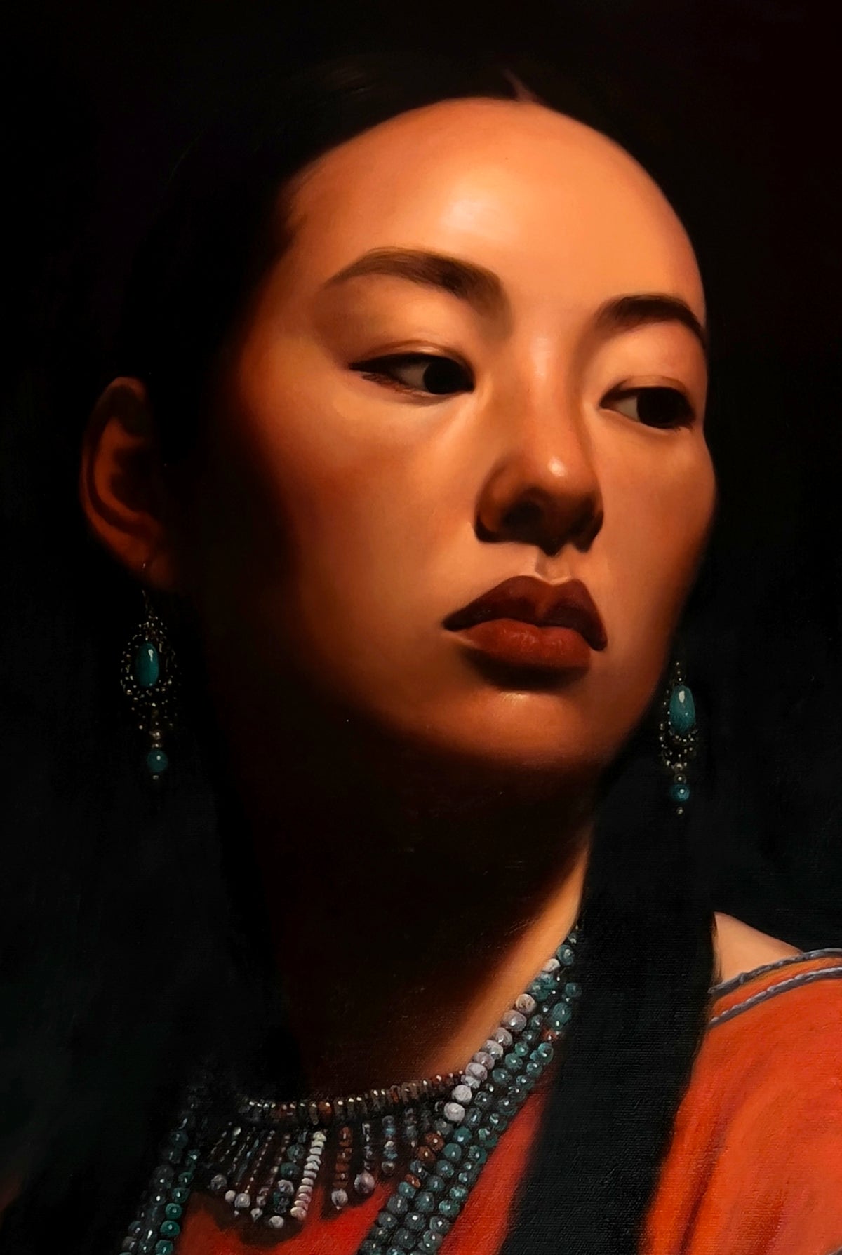 MEFREEK Seth Jennemann Original Oil Painting "Afterlife Of Small Talk" featuring a hyperrealistic close-up portrait of a dark-haired woman with warm golden skin, deep brown eyes, and rich burgundy lips. Her face is turned slightly to the right, with her gaze directed sideways and downward. Ornate turquoise drop earrings frame her face, while intricate turquoise and white beaded necklaces complement her vibrant burnt-orange clothing. Dramatic chiaroscuro lighting illuminates her forehead, cheekbones, nose, a