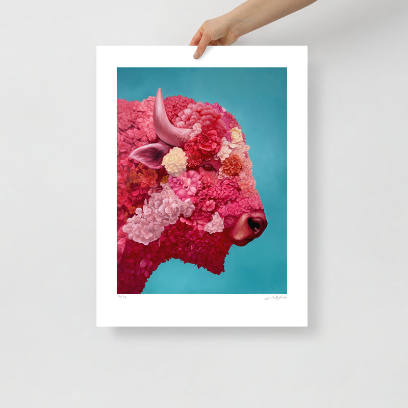 MEFREEK Seth Jennemann Limited Edition Print floral buffalo bison portrait composed of vibrant pink and red blossoms forming a detailed side profile with soft shading and organic texture on a teal background presented as a physical print held by a hand with a white border