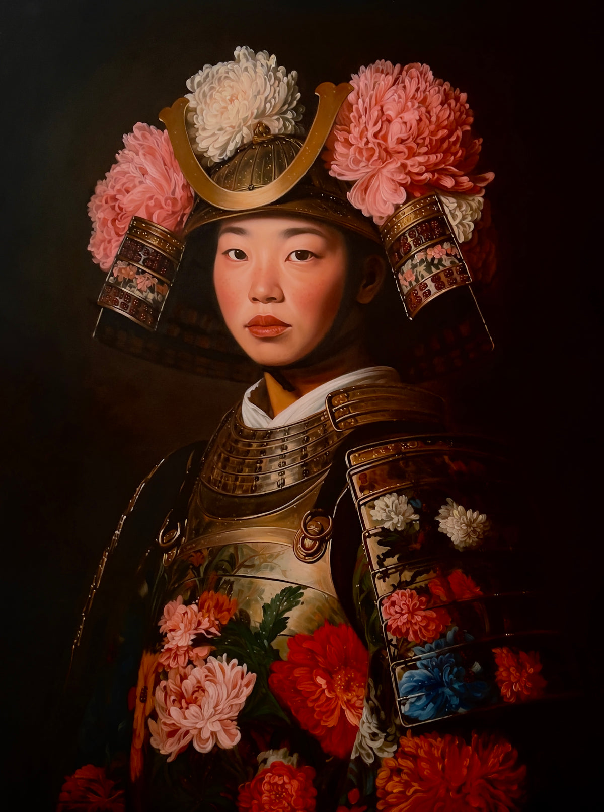 MEFREEK Seth Jennemann Original Oil Painting Best Wishes From A Safe Distance – Full-length vertical composition of a young Asian woman dressed in elaborate Japanese samurai armor adorned with colorful chrysanthemums. Her bronze and gold helmet features a sweeping golden crest surrounded by oversized pink and white flowers. Intricately detailed metallic chest and shoulder armor is decorated with red, pink, white, orange, and blue chrysanthemums. She faces forward with a calm, composed expression against a d