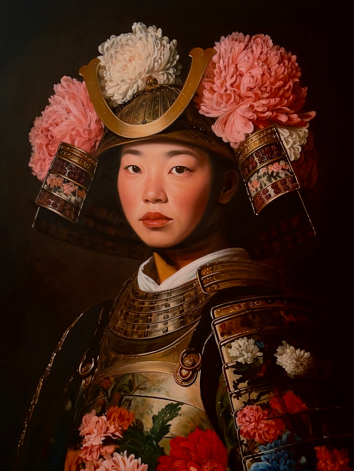 MEFREEK Seth Jennemann Original Oil Painting Best Wishes From A Safe Distance – Detailed three-quarter portrait of a young Asian woman in ornate Japanese samurai armor embellished with chrysanthemums. Large pink and white flowers surround her bronze helmet and curved golden crest, while smaller red, white, pink, and blue blossoms decorate the layered metallic chest and shoulder plates. Her face is softly lit, with a direct, steady gaze and a composed expression. Rich bronze tones, delicate floral textures, 