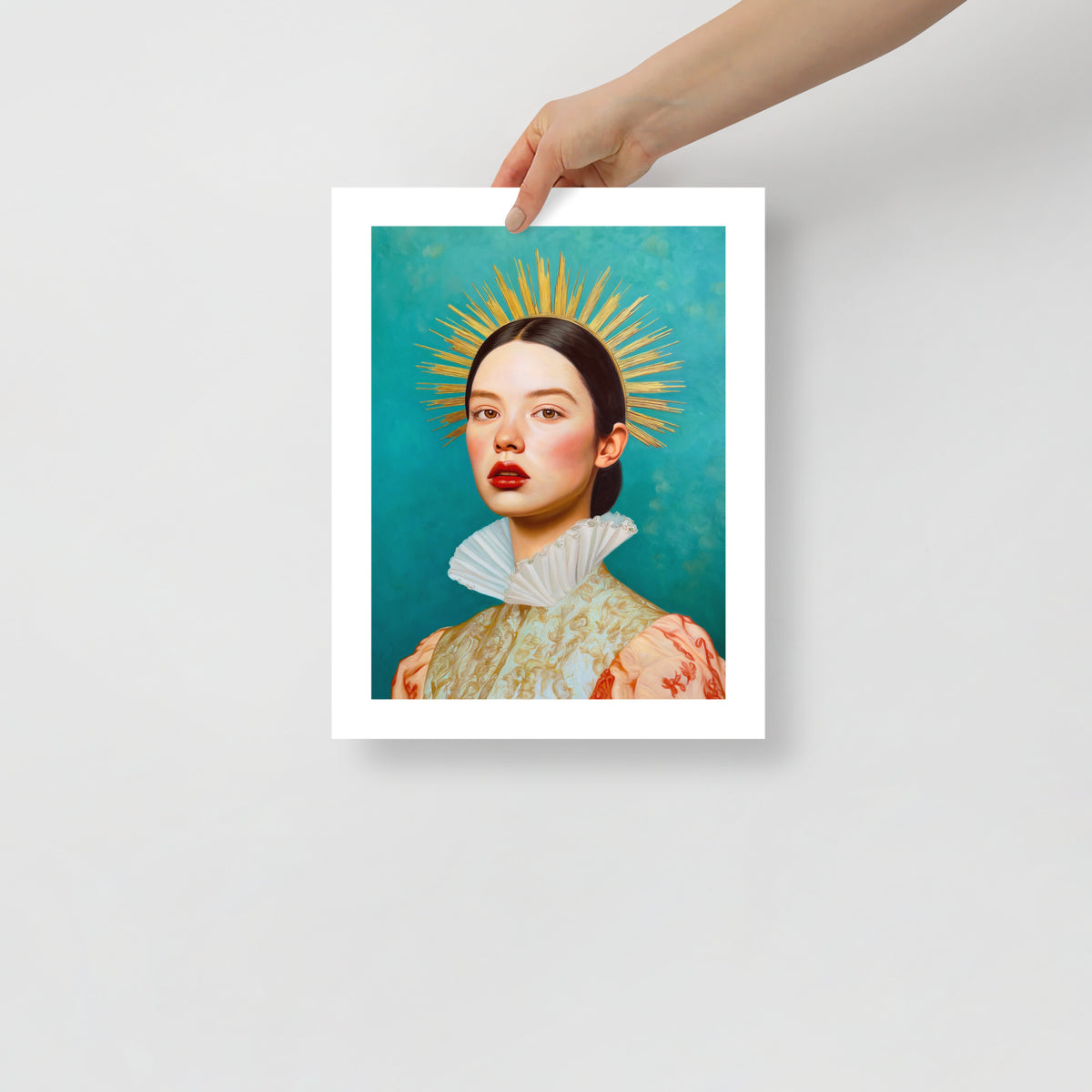 MEFREEK Seth Jennemann Open Edition Print “I Said Nothing, So They Heard What They Wanted” — vivid fine art print showing a poised woman with red lips and a golden sunburst halo, held by a person for size reference.