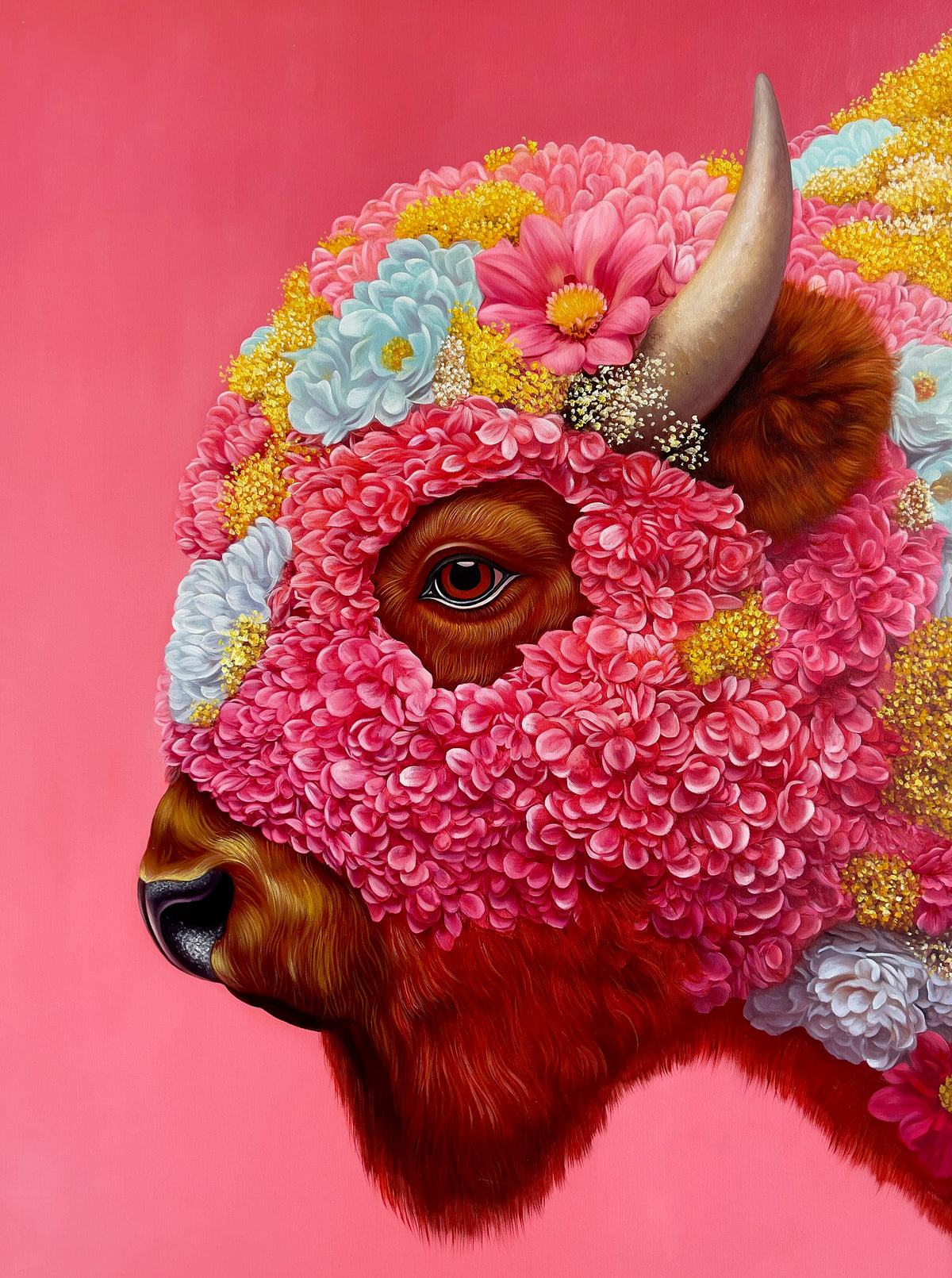 MEFREEK Seth Jennemann I Was Just The Frame hyperreal oil painting of a buffalo portrait wearing a pink floral mask with blue flowers, yellow flowers, and a horn visible, surreal animal portrait on a bright pink background