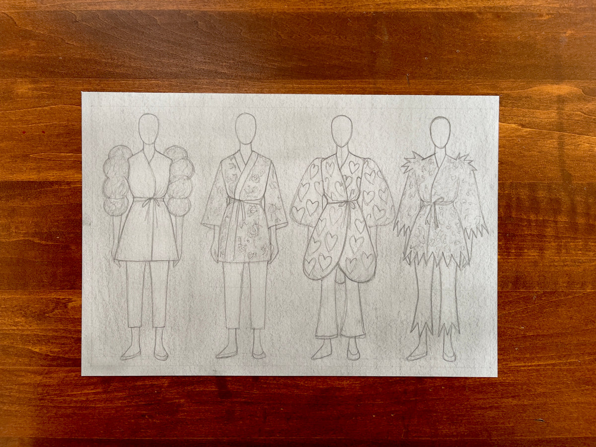 Seth Jennemann MEFREEK — Melancholy and the Fleshlight of Sadness, graphite pencil fashion illustration in conceptual sketch style. Four faceless figures model avant-garde kimono-inspired designs with oversized sleeves, puffed shoulders, heart motifs, and jagged hems on a light paper background.