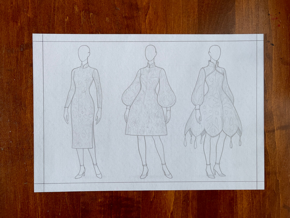 Seth Jennemann MEFREEK She Likes It Better Wrong – graphite croquis drawing in a conceptual fashion illustration style featuring three faceless figures in fitted dresses that evolve from sleek minimalism to exaggerated sculptural forms with floral patterns and bulbous shapes.
