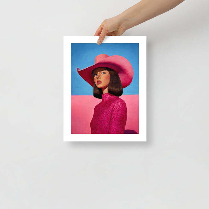 MEFREEK Seth Jennemann Open Edition Print stylized portrait of a woman in a vivid pink cowboy hat and patterned high neck garment, smooth skin tones and clean composition contrasted by a pastel blue and pink split background in a refined surreal realism style