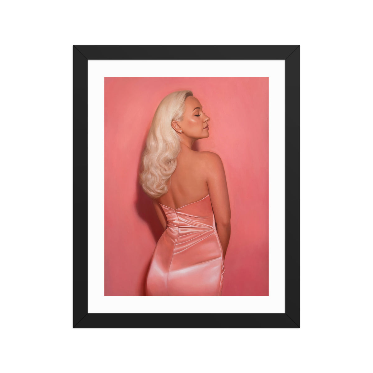 MEFREEK Seth Jennemann Open Edition Art Prints Two For The Price Of Two – Framed fine art portrait print displayed in a sleek black frame with a wide white border, featuring a blonde woman with cascading platinum curls and closed eyes, posing in a luminous strapless pink satin dress against a monochromatic rosy pink background.