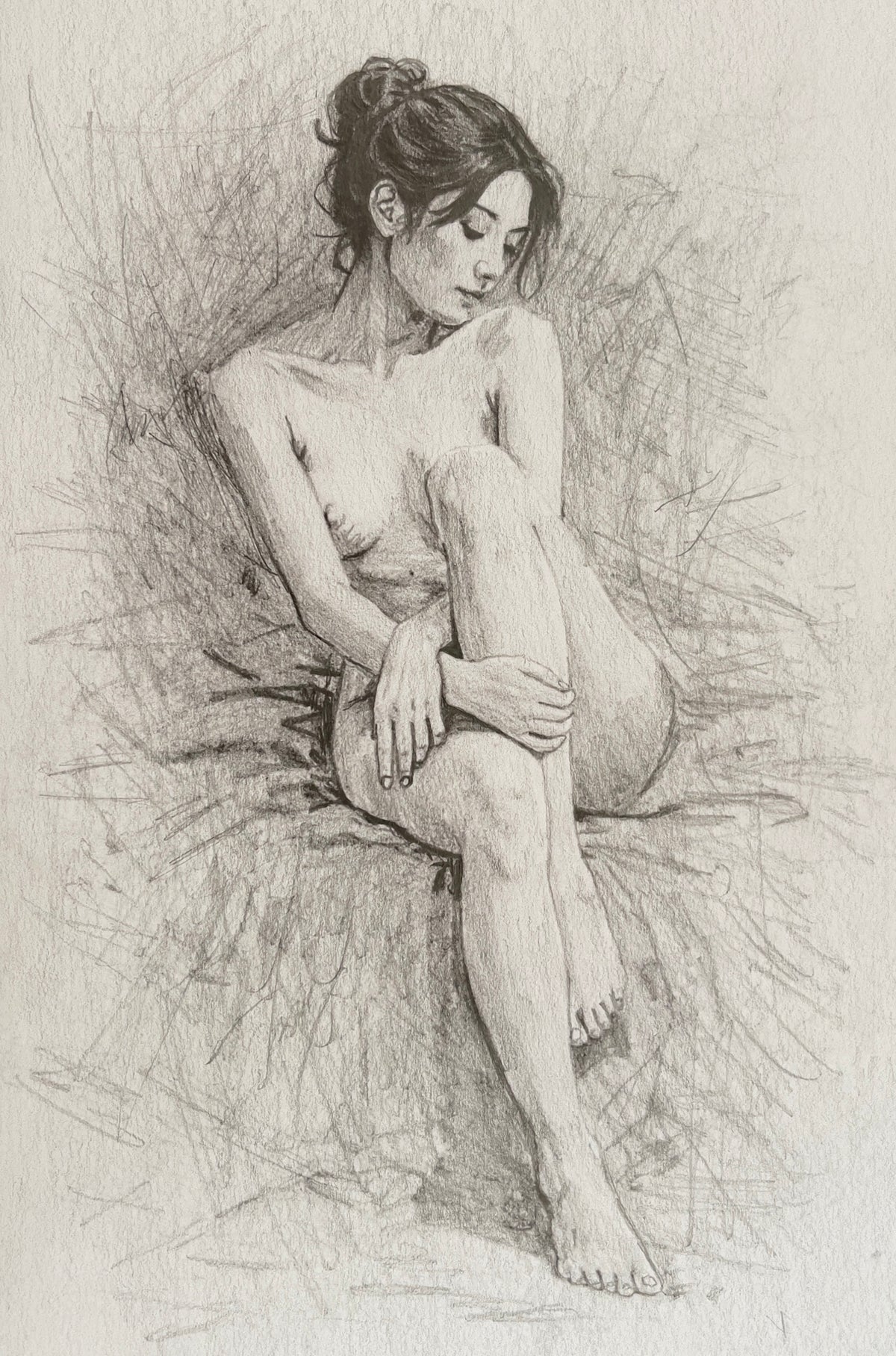 MEFREEK Seth Jennemann Soft Graphite Figure Study of a seated nude woman with legs drawn inward gentle posture and delicate shading surrounded by expressive sketch lines highlighting form mood and subtle anatomical detail on textured paper
