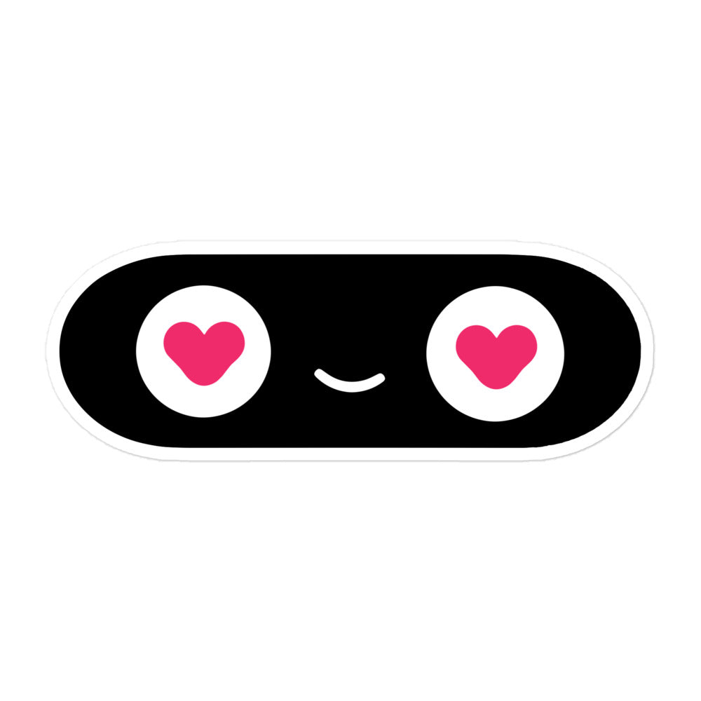 Sticker design with two pink hearts and a smiley face on a black oval background.