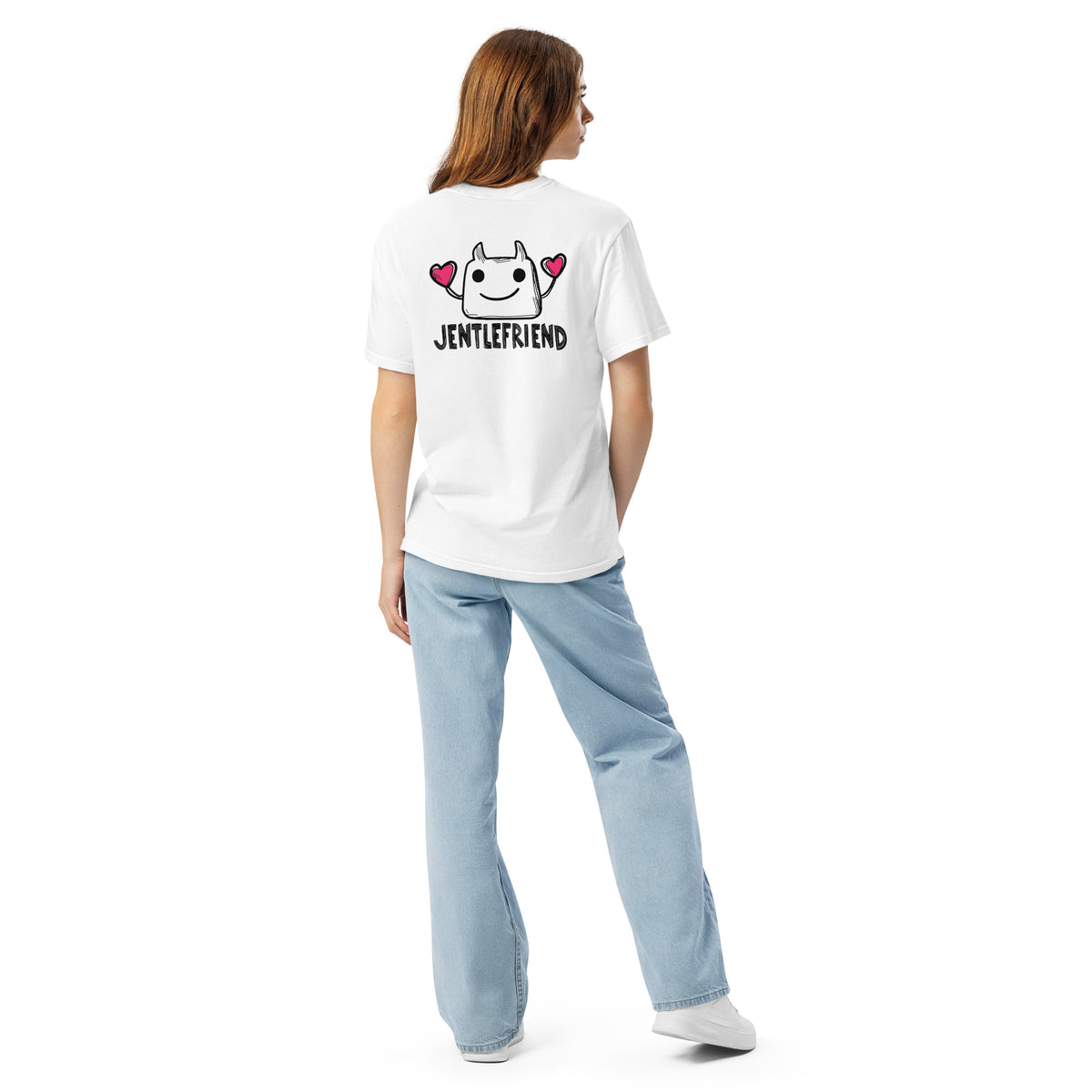 Person wearing a white t-shirt with a graphic design and text on the back, standing against a white background.