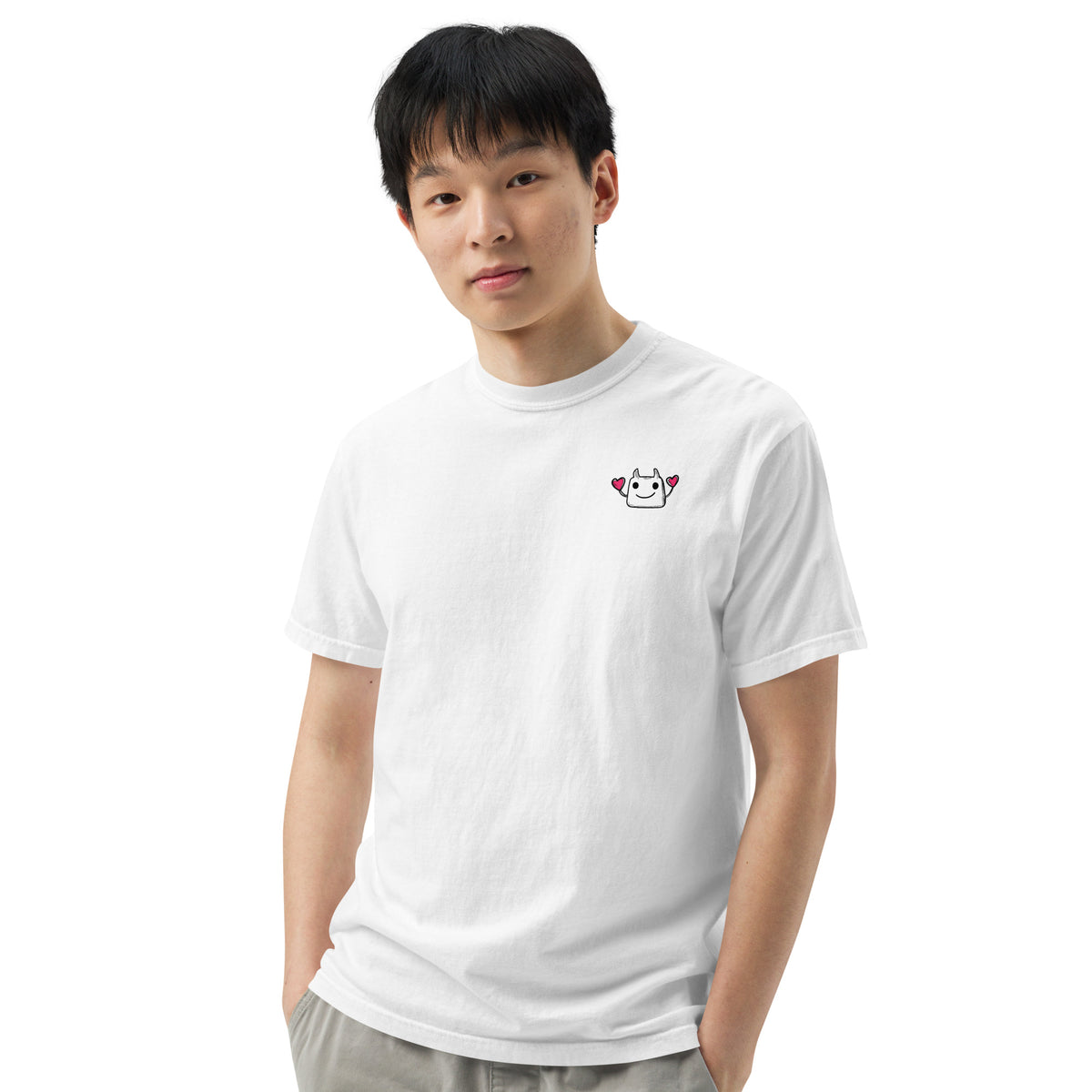 Person wearing a white t-shirt with a logo on a white background