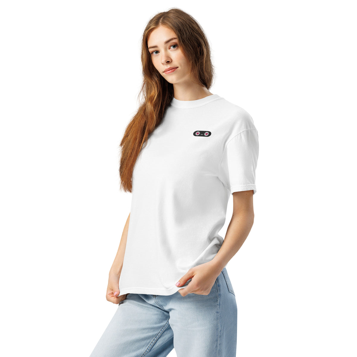 Woman wearing a white t-shirt with text on a plain background